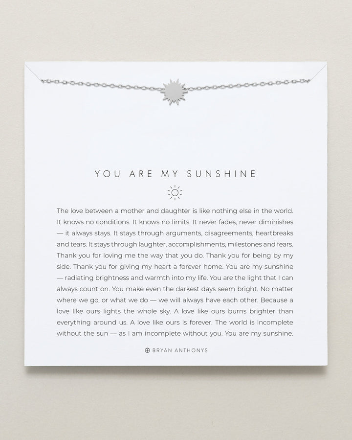 Bryan Anthonys You Are My Sunshine necklace with sun pendant on chain