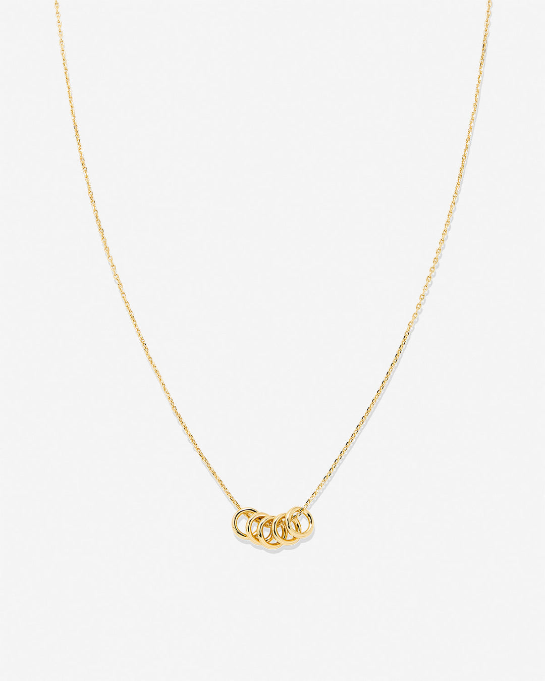 Gold dainty necklace with interconnected circle rings pendant on delicate chain