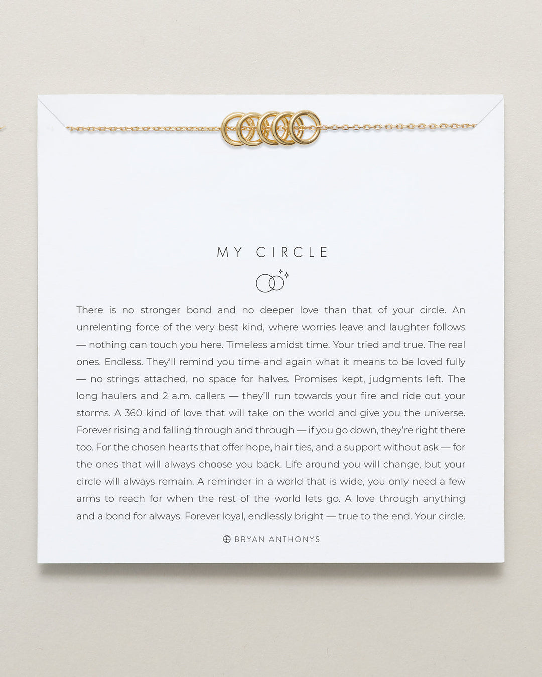 Bryan Anthonys My Circle gold necklace with interlocked circles on inspirational card