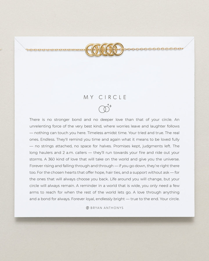 Bryan Anthonys My Circle gold necklace with interlocked circles on inspirational card
