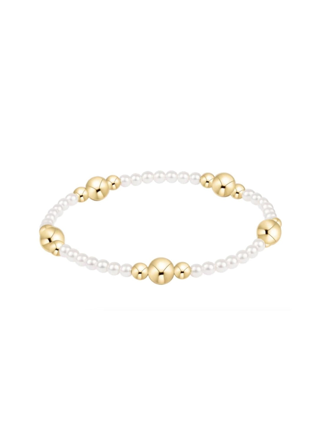 Enewton white pearl and gold bead bracelet on clean white background