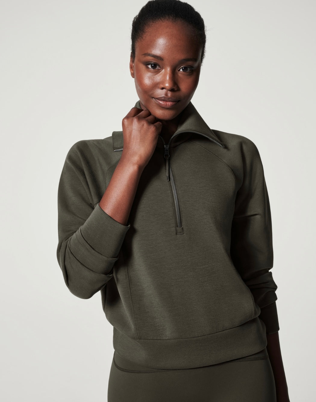 Spanx: Airessentials Half Zip in Dark Palm