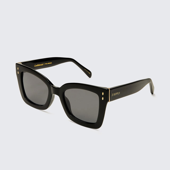 Z Supply Confidential polarized sunglasses in polished black with grey lenses and gold accents